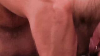 Muscular dude John Powers secretes loads of cum after handjob