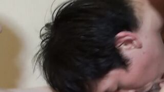 Asian twink jacks off while Japanese lover licks his balls
