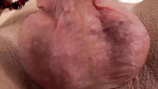 Big dicked dude Rainbow Dick strokes his manhood then licks his creamy cum