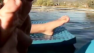 Goth teenie Asher Christiansen in cock stroking and foot worshiping session