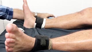The hairy guy restrained and tickled tormentedÂ handsome Drew Harper