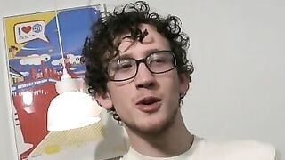 Skinny curly haired amateur jerking off his thick dick solo