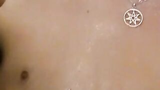 Sexy Bleu is blowing smoke and stroking his cock in the while taking a shower