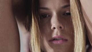 Lovely pierced woman Chrissy Fox caresses herself and seduces with her eyes
