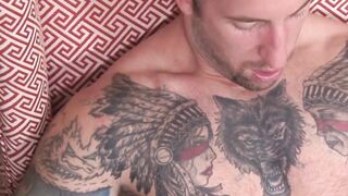 Muscular tattooed soldier Brad Powers strokes huge cock solo
