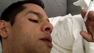 Big cock Bobby Hart chainsmokes and strokes his long cock in a jockstrap