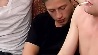 Two handsome twinks mess around the couch while smoking