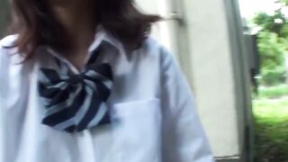 Japanese beauty playing with her pussy while being taped