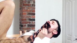 Hot businessman Drew Dixon sucks on tie while dildo playing