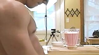 Muscular masked man masturbates big dick in the kitchen solo