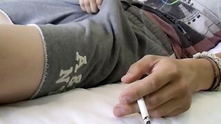 Hung puts himself into a wild ass fingering and chainsmoking session