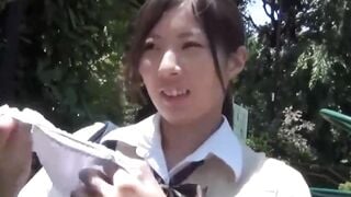 Nerdy Japanese schoolgirl with glasses teases in public