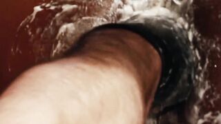 Race Cooper moans soft and low as he rocks in a sling, swaying ever so gently to and