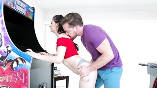 Naughty teen plays arcades while getting nailed from behind
