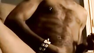 Black amateur strips and masturbates into an intense orgasm