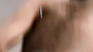 Black amateur strips and masturbates into an intense orgasm