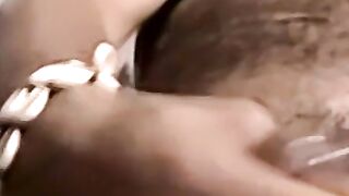 Black amateur strips and masturbates into an intense orgasm