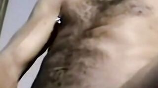 Black amateur strips and masturbates into an intense orgasm
