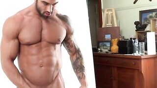 Inked hunk is masturbating for the camera before cumming