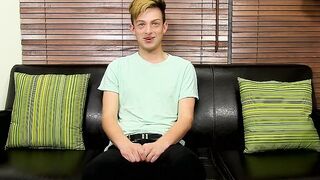 Adorable twink is interviewed and then he takes a big toy