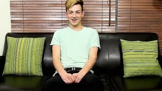 Adorable twink is interviewed and then he takes a big toy