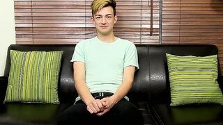 Adorable twink is interviewed and then he takes a big toy