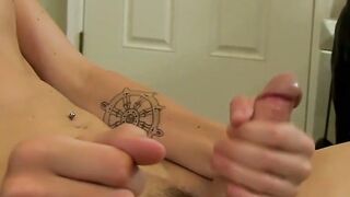 Tiny twink passionately strokes his own arse while dildoing