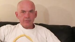 Bald amateur teases his thick throbbing cock in kinky solo