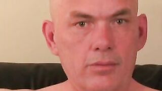 Bald amateur teases his thick throbbing cock in kinky solo