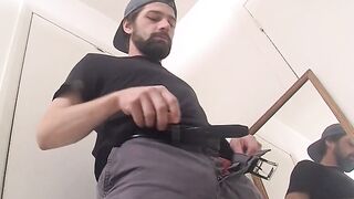 Bearded straight dude tugging and spraying the mirror