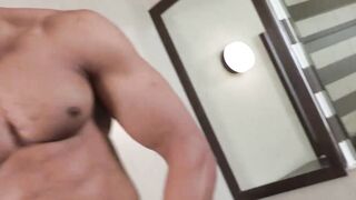Muscular black hunk flexes his muscles while jerking solo