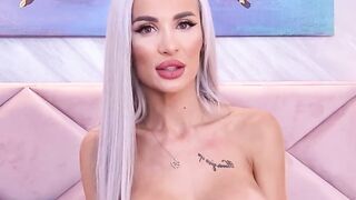 Skinny blonde with big fake tits