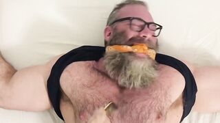 Bound bearded muscular hunk recives body and foot tickling