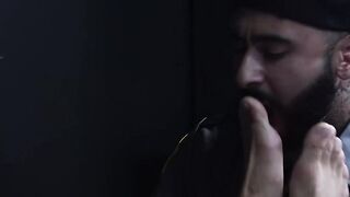 Deviant bearded guard foot fucks restrained prisoner