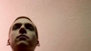 Skinny amateur twink with glasses spanks his cock and cums