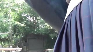 Japanese schoolgirl playing with her pussy over panties