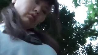 Japanese schoolgirl playing with her pussy over panties