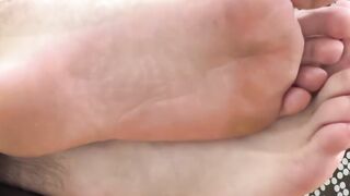 Nathan L showed off his smooth soles and cute toes after a hard day
