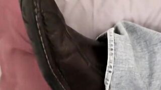 A gorgeous young guy with big feet and a juicy cock drains his cum load