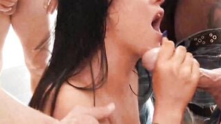 Sexy brunette Romi Rain shows how wild she can be in this ten guy blowbang