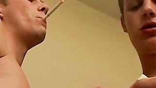 Alluring lover spreads his ass while he smokes a cigar