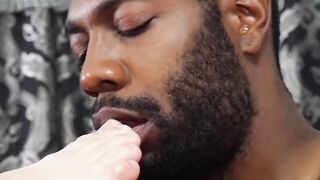 Black dominant man foot fucks and worships bound hunk
