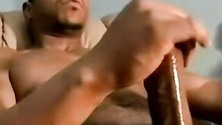 Hunky black dude jerks off and cums while sucked by old man