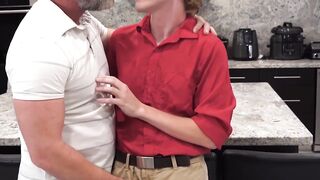 Horny stepdad gives young stepson blowjob in kitchen