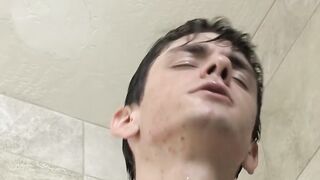 Wild twink Nathan stuffs dildo while wanks off under shower