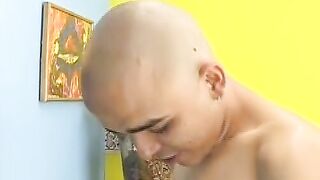 Kinky skinhead latino Cristobal is on the sofa wanking dick