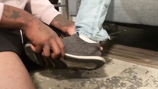 Black stud receives footjob and cums on lovers feet