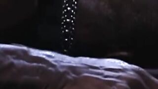 Over on a red workbench, Michael Brandon dives full-on into Simon Cox's stunning ass.