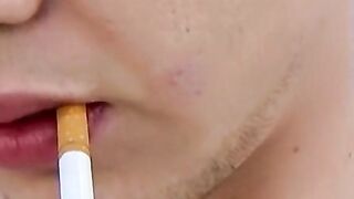 Tattooed twinks blowing clouds of smoke to his dick