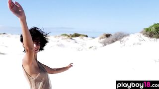 Slender all natural nude Hottie Ariel liking the sunshine at the beach